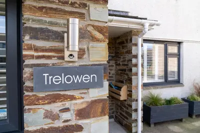 a sign on the side of a building at Trelowen in Padstow