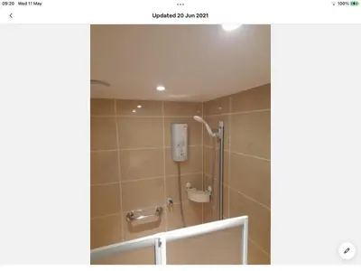 a bathroom with a shower stall with a shower at Bosloe in Helston