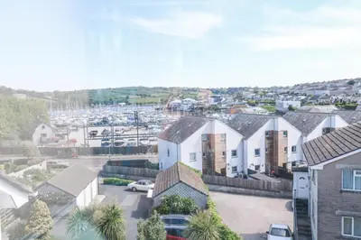 arial view of a residential neighbourhood with a marina at Flat 6 in Falmouth