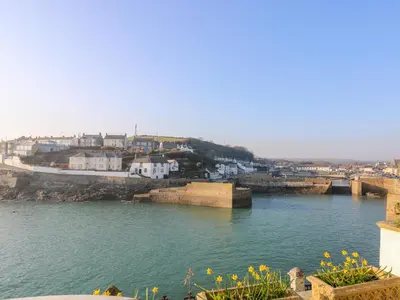 a view of a body of water with houses and buildings at Chi Lowarth in Helston