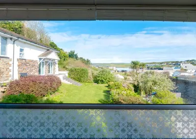 a view from a window of a house at Beach Haven in Wadebridge