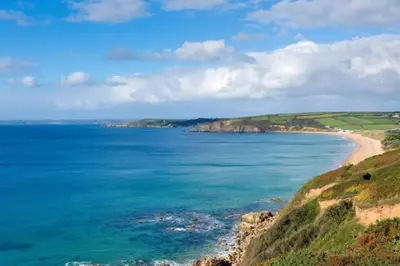 a view of the ocean and a beach at Lovely Cornish cottage in small village setting in Saint Hilary