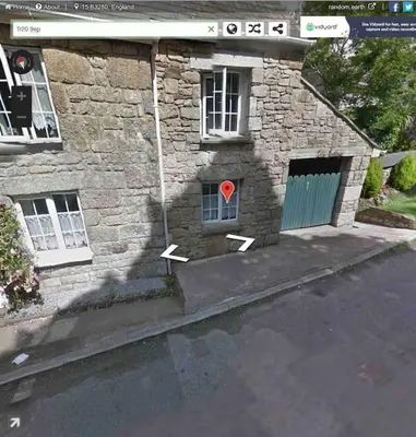 a stone building with a door with a heart on it at Lovely Cornish cottage in small village setting in Saint Hilary
