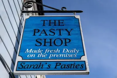 a sign for the pastry shop on the premises at Beautiful 3 bedroom cottage in the heart of Looe in Looe