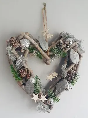 a christmas wreath with pine cones and stars at Looe with a View - Entire apartment with FREE allocated parking in Looe