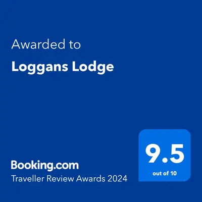 a blue screen with the text awarded to logans lodge at Loggans Lodge in Hayle