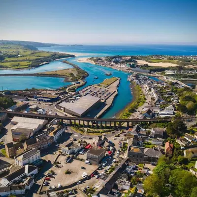 an aerial view of a town with a harbor at Loggans Lodge in Hayle
