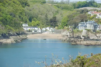 a view of a river with houses and a beach at Detached House 2 Bed Sleeps 4 Parking in Fowey