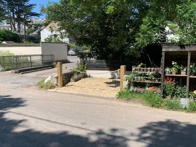 a flower shop on the side of a road at The Annexe at Tenniside in Perranporth