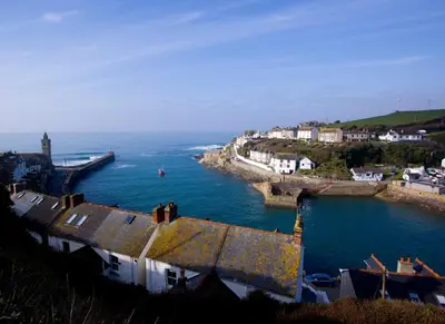 a view of a town with a body of water at The Artist Loft, Ensuite Guest Rooms, Porthleven in Porthleven