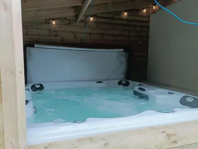 a jacuzziificialificialificialificialificialificialificialificialificialificialificial at Shackled-Am-Not - Luxury home sleeps 8 with hot tub and games room North Cornwall in Camelford