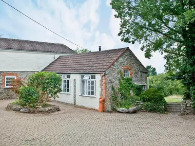 an old brick house with a driveway in front of it at Granary - Uk31175 in Saint Martin