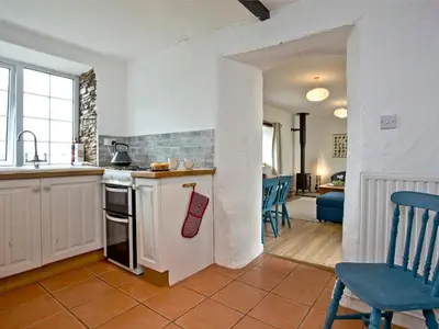 a kitchen with a sink and a stove top oven at Granary - Uk31175 in Saint Martin