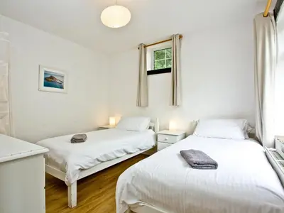 two beds in a room with white walls at Granary - Uk31175 in Saint Martin
