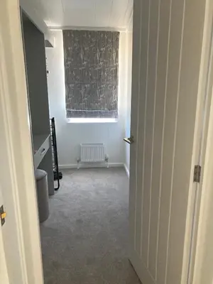 an empty room with a window and a door at Beach Base Lodge, Padstow Cornwall in Padstow