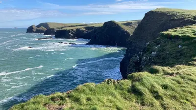 a view of the ocean from a cliff at Beach Base Lodge, Padstow Cornwall in Padstow
