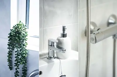 a bathroom with a sink and a faucet at Len's Lookout in St Ives