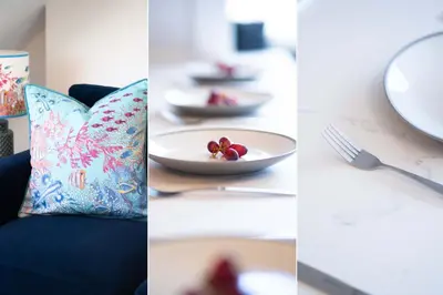 a table with a plate of food and a fork at Len's Lookout in St Ives