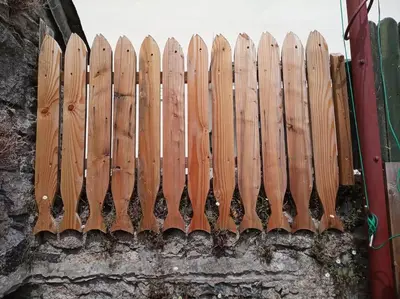 a wooden fence on the side of a building at The Captain's House Charlestown St Austell in Charlestown