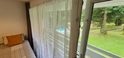 a sliding glass door with a view of a yard at 3 Manor Villas Newquay in Newquay