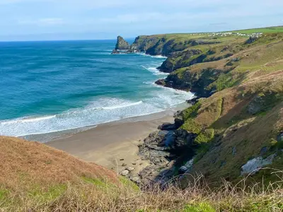 a view of the ocean and a beach at Polrunny Farm sea view Blueberry Cottage with log burner in Boscastle
