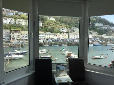 a view of a harbor with boats in the water at Shellseekers Guest House in Looe
