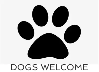 a black dog paw print with the text dogs welcome at Peaceful, rural cottage on the outskirts of Padstow in Padstow