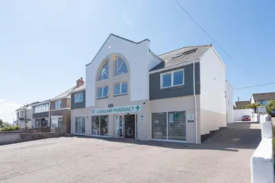 a store front of a building on a street at 7 Trevose House, St Ives in Carbis Bay