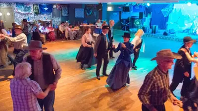 a group of people dancing on a dance floor at Newquay Bay Resort 181 in Porth