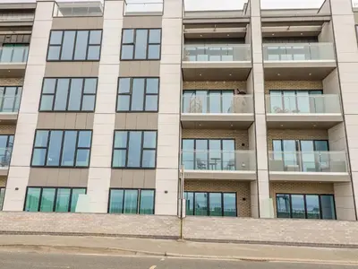 an apartment building with many windows at 30 Cliff Edge in Newquay