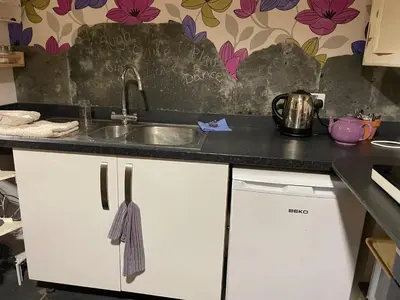 a kitchen with a sink and a counter top at The Mill'ouse in Launceston