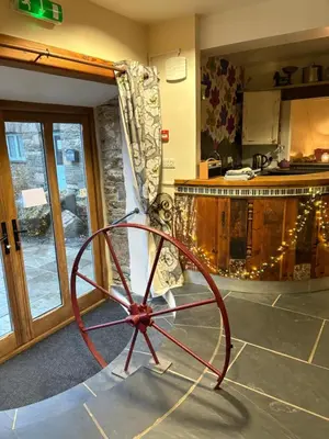a large metal object in a room with a kitchen at The Mill'ouse in Launceston