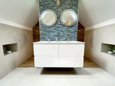 a bathroom with a white sink and two mirrors at Trewhiddle Retreat V9 by Together Travel - Luxury 4-Bedroom Villa in St Austell