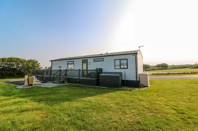 a tiny house on the side of a road at Chantry Lodge in Newquay