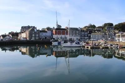 a harbor with boats in the water and buildings at Padstowgetaways in Padstow