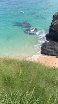 an aerial view of a beach and the ocean at Marios Lodge in Padstow