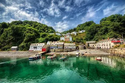 a group of boats in a body of water at Gorgeous Cottage at Crackington Haven, near Bude and Boscastle, Cornwall in Bude