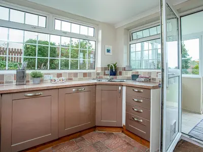 a kitchen with a sink and a shower at Tanglewood in Bugle