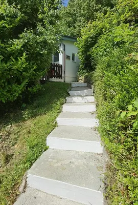a stepping stone path leading to a house at Bantry Cottage at Crackington Haven, near Bude and Boscastle, Cornwall in Bude