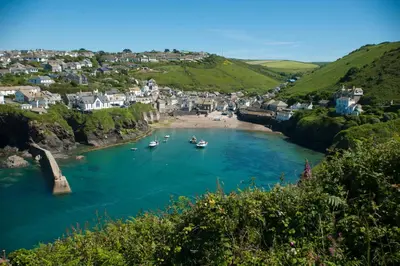 a view of a river with boats in it at Kallowen Cottage at Crackington Haven, near Bude and Boscastle, Cornwall in Bude