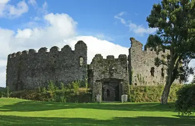 an old castle in the middle of a field at Penrose Bed & Breakfast in Lostwithiel