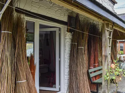 a front door of a house with some grass at Tinners Gate in Saint Cleer