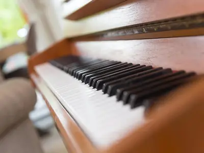 a close up of a wooden piano keyboard at Branock, Tor Down Quarry in Bodmin