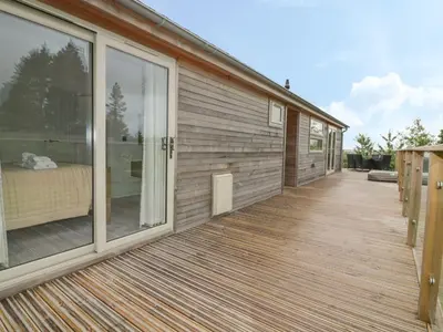 a large deck with a bed on a house at 7 Faraway Fields in Liskeard