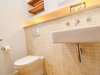 a bathroom with a sink and a toilet at 12 Faraway Fields in Liskeard