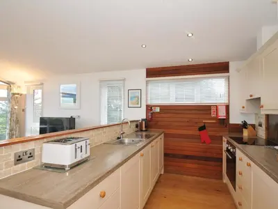 a kitchen with a sink and a counter top at 11 Horizon View in Liskeard
