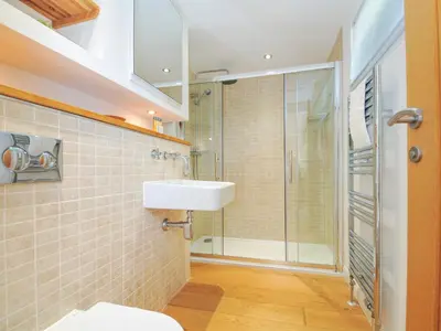 a bathroom with a sink and a shower at 15 Horizon View in Liskeard