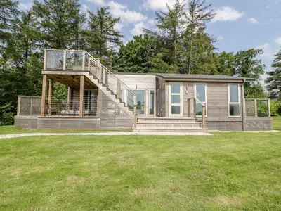 a house with a large yard in front of it at 4 Faraway Fields in Liskeard