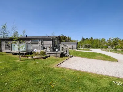 a home with a large yard with a house at 7 Meadow Retreat in Liskeard