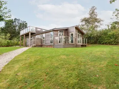 a house with a large yard in front of it at 1 Southern Place in Liskeard